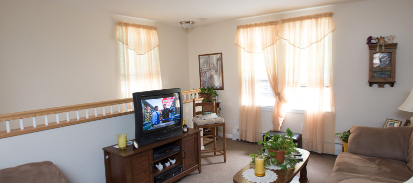 A living area with a working television